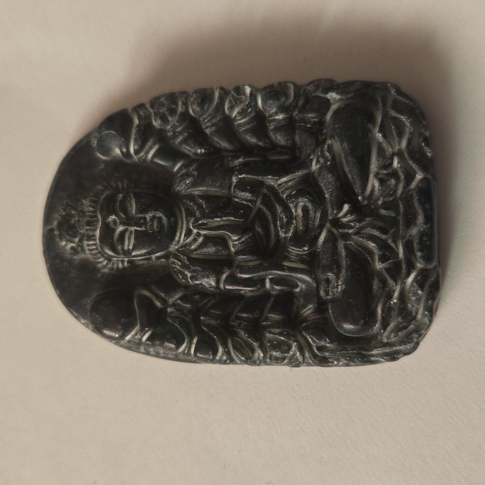 Dark green jade pendant